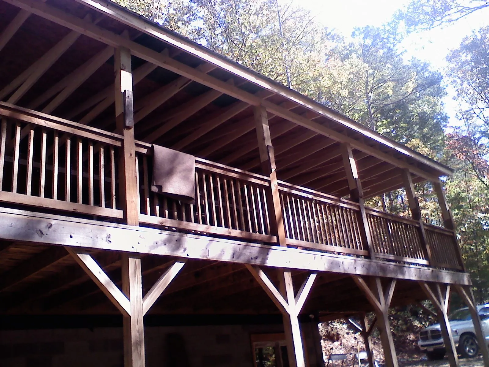 Timber framing under a new elevated porch and deck — Roof Leak Repair in Mocksville by Roofing Brothers